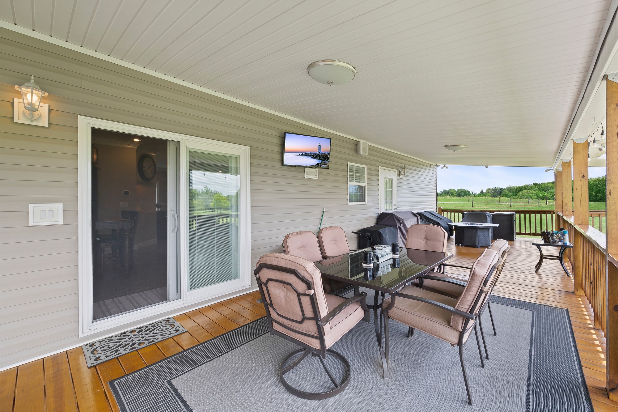103 Molten Lane Hilham, TN 38568 - Photo 27 of 39 a living room with patio furniture and a floor to ceiling window