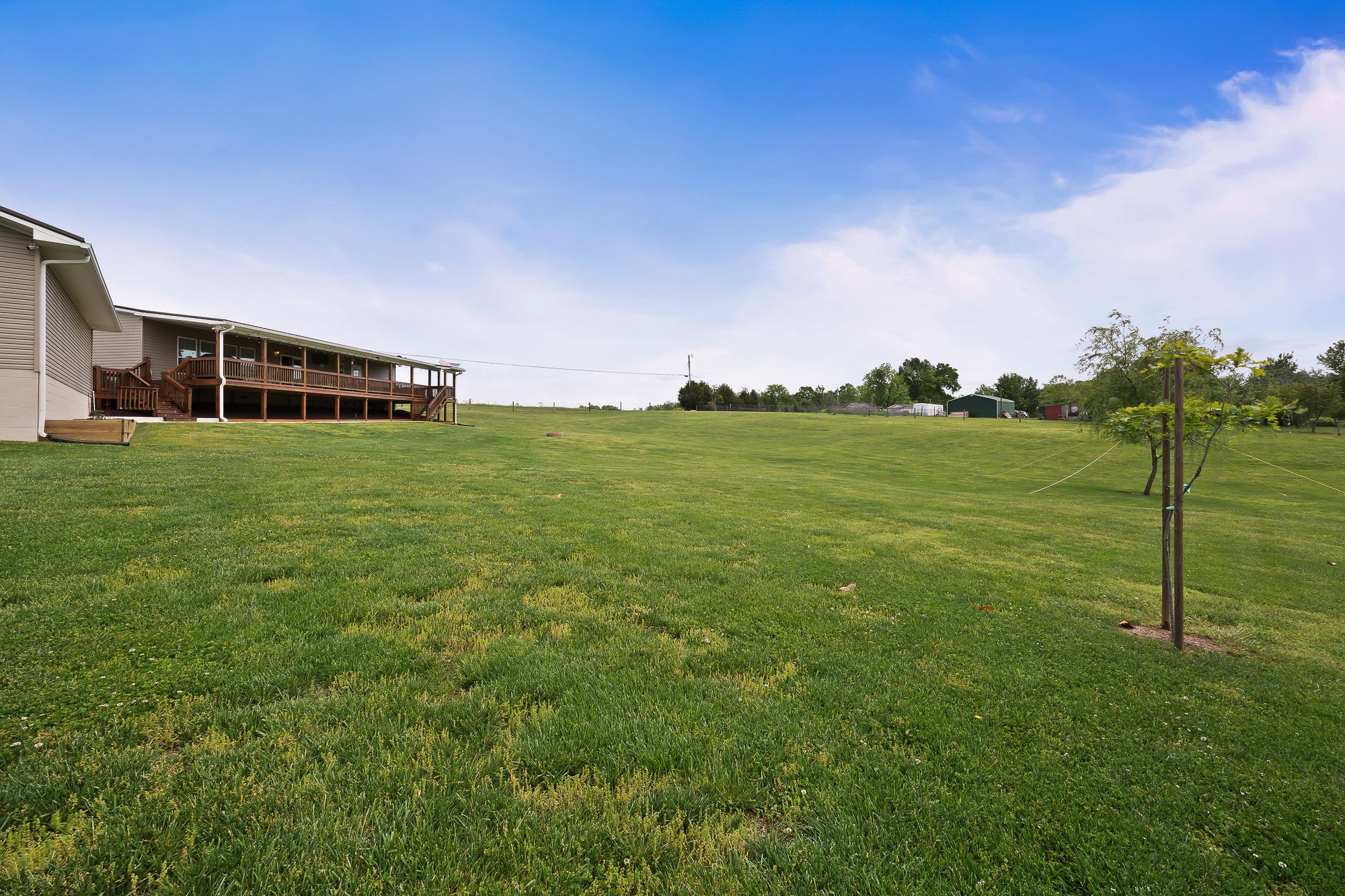 103 Molten Lane Hilham, TN 38568 - Photo 29 of 39 a view of a big house with a big yard