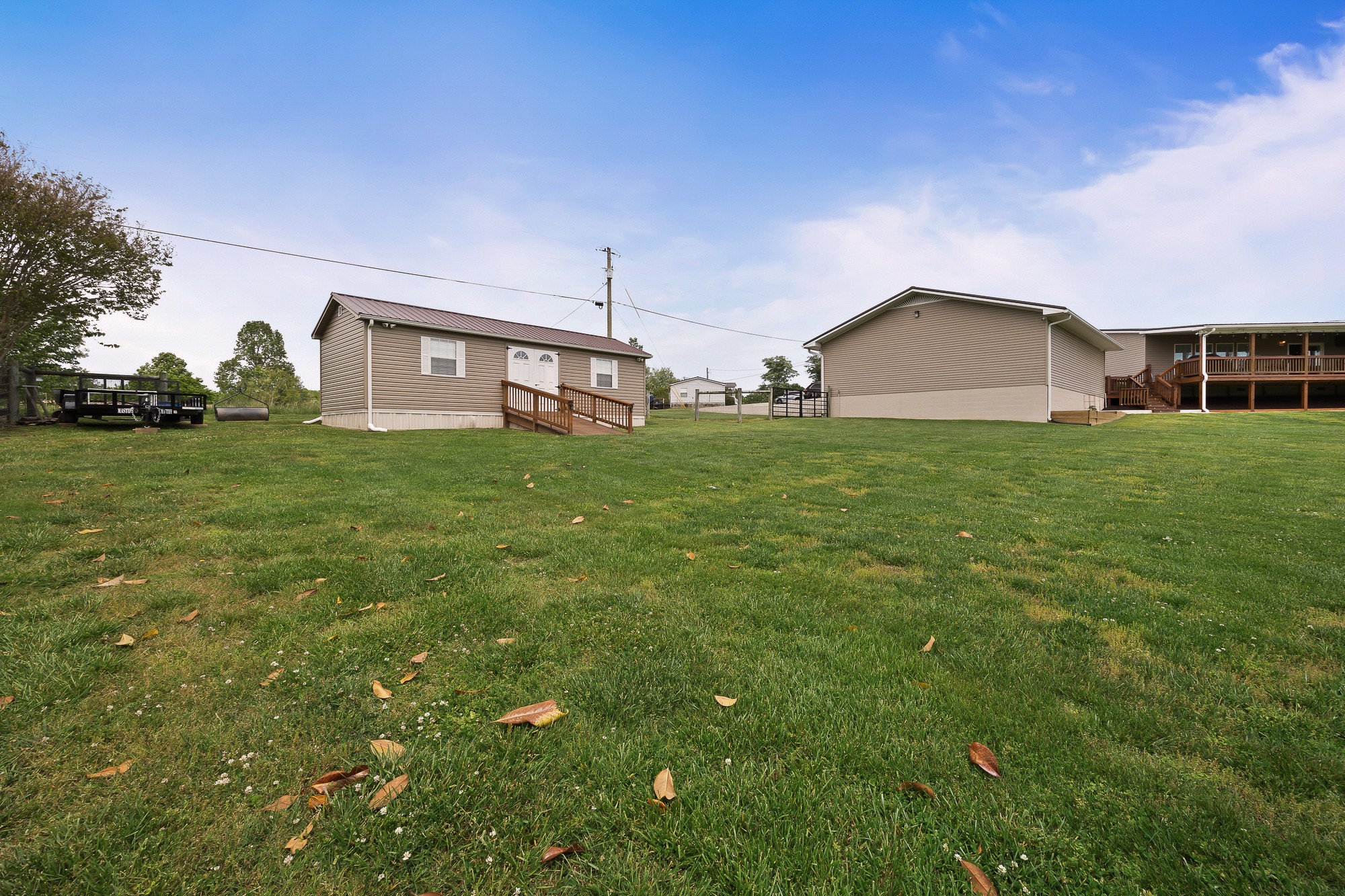 103 Molten Lane Hilham, TN 38568 - Photo 30 of 39 a view of a yard in front of a house with a yard