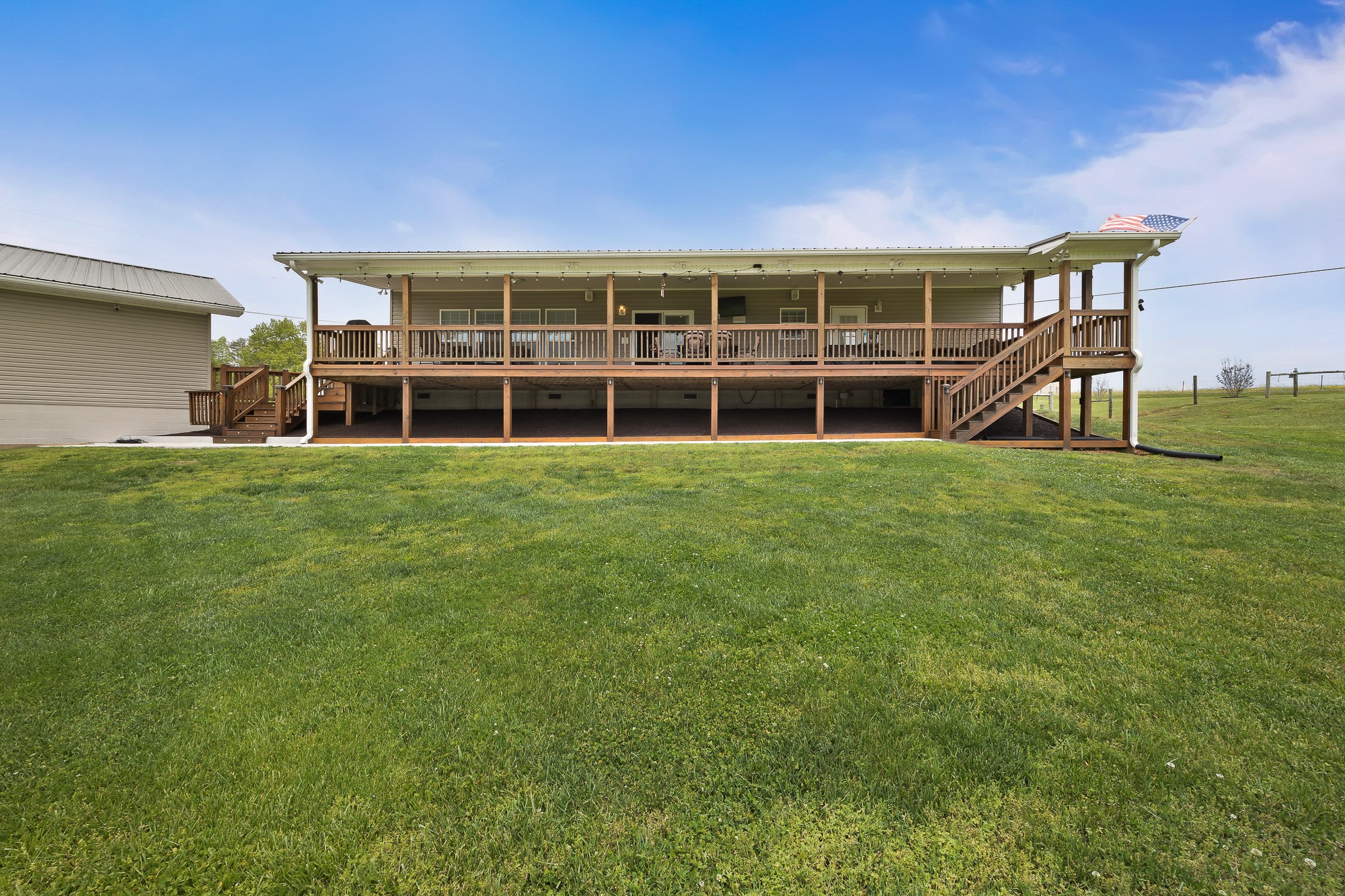 103 Molten Lane Hilham, TN 38568 - Photo 33 of 39 a view of a house with a big yard and large trees