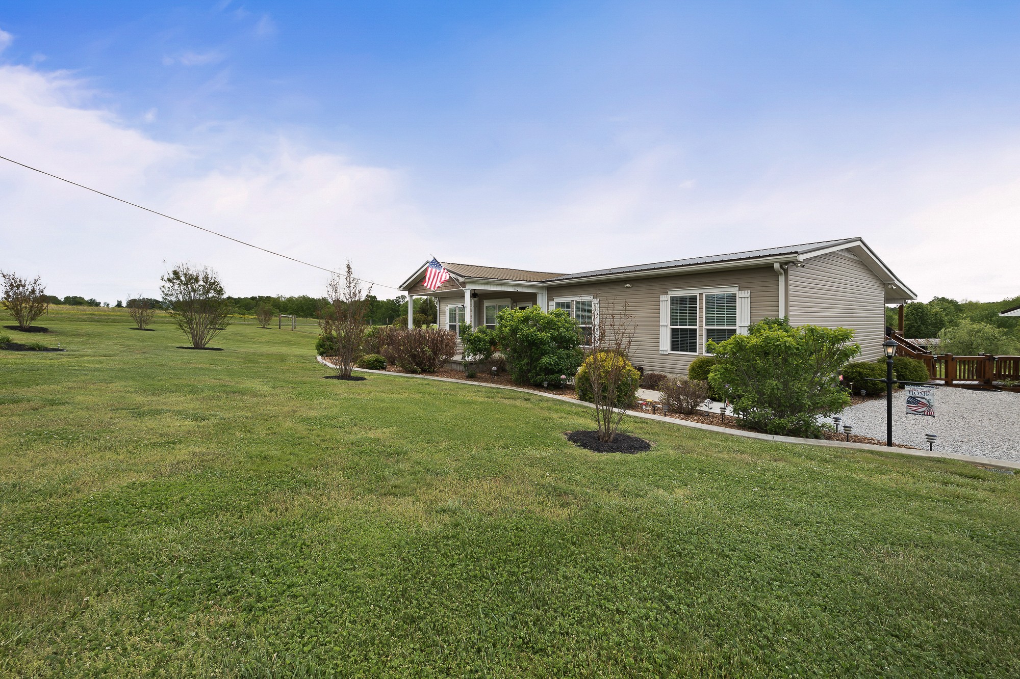 103 Molten Lane Hilham, TN 38568 - Photo 36 of 39 a view of a house with a yard and a garage