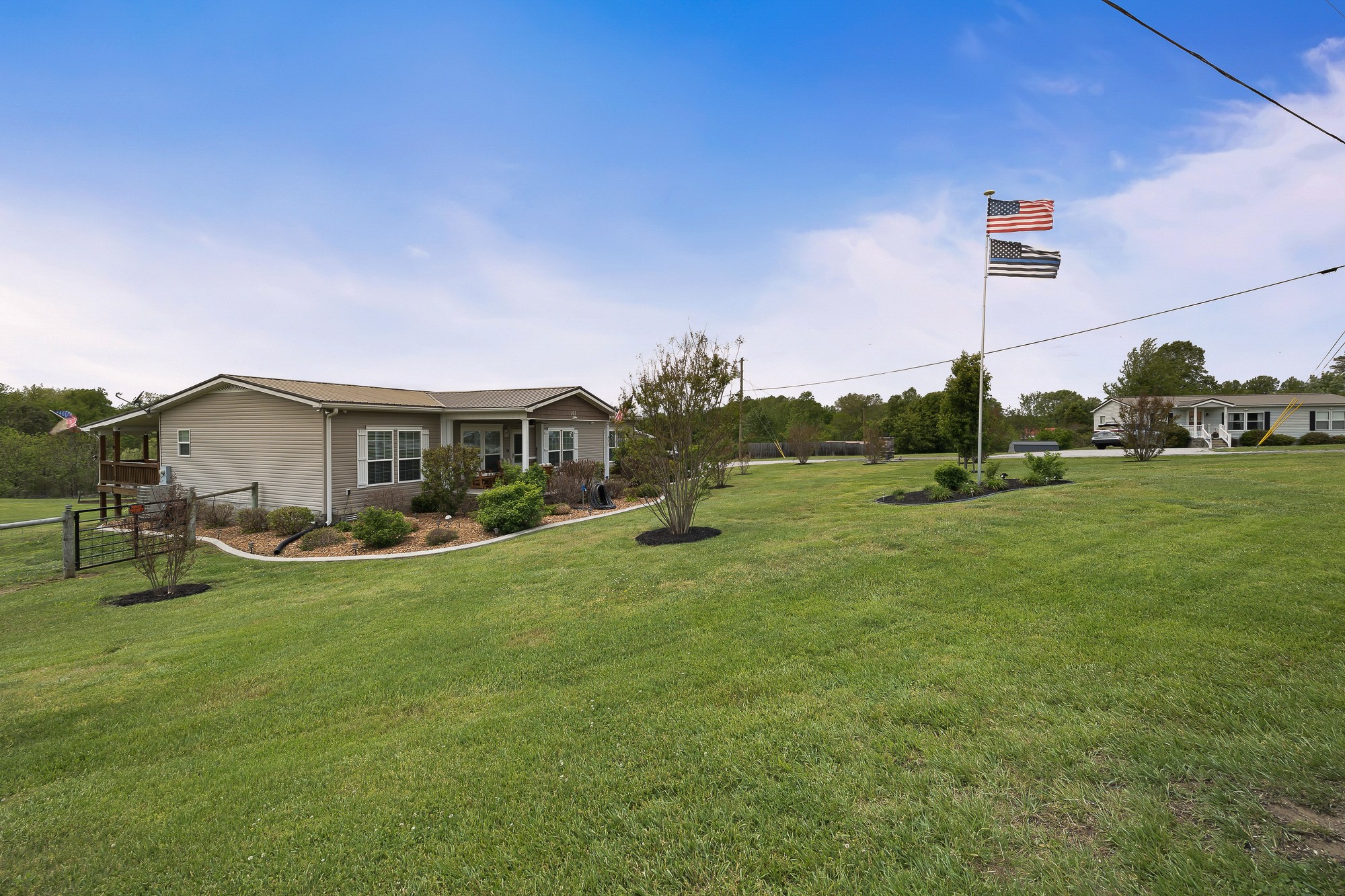 103 Molten Lane Hilham, TN 38568 - Photo 38 of 39 a view of a house with backyard and sitting area