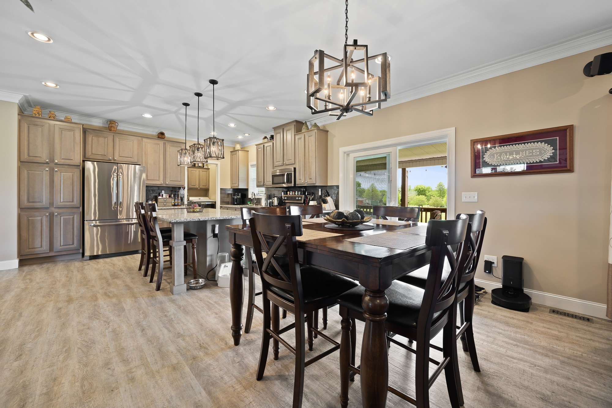 103 Molten Lane Hilham, TN 38568 - Photo 9 of 39 a view of a dining room with furniture wooden floor and chandelier