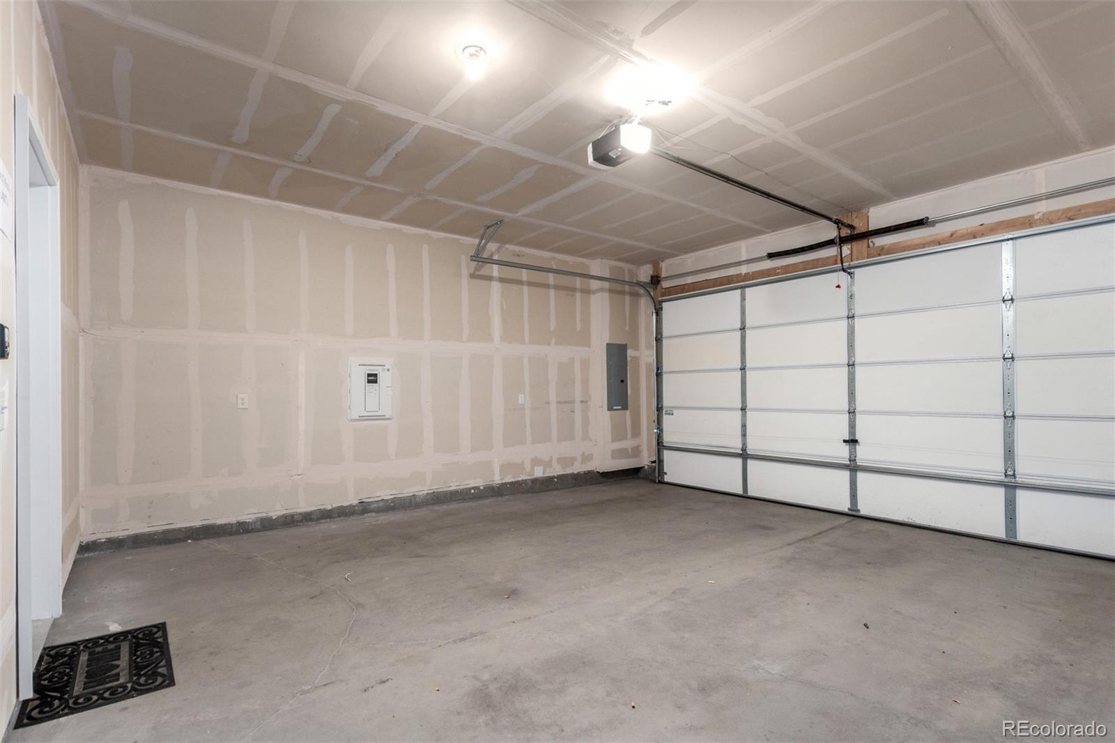 8417 Rizza Street, Unit A Littleton, CO 80129 - Photo 15 of 25 a view of a garage