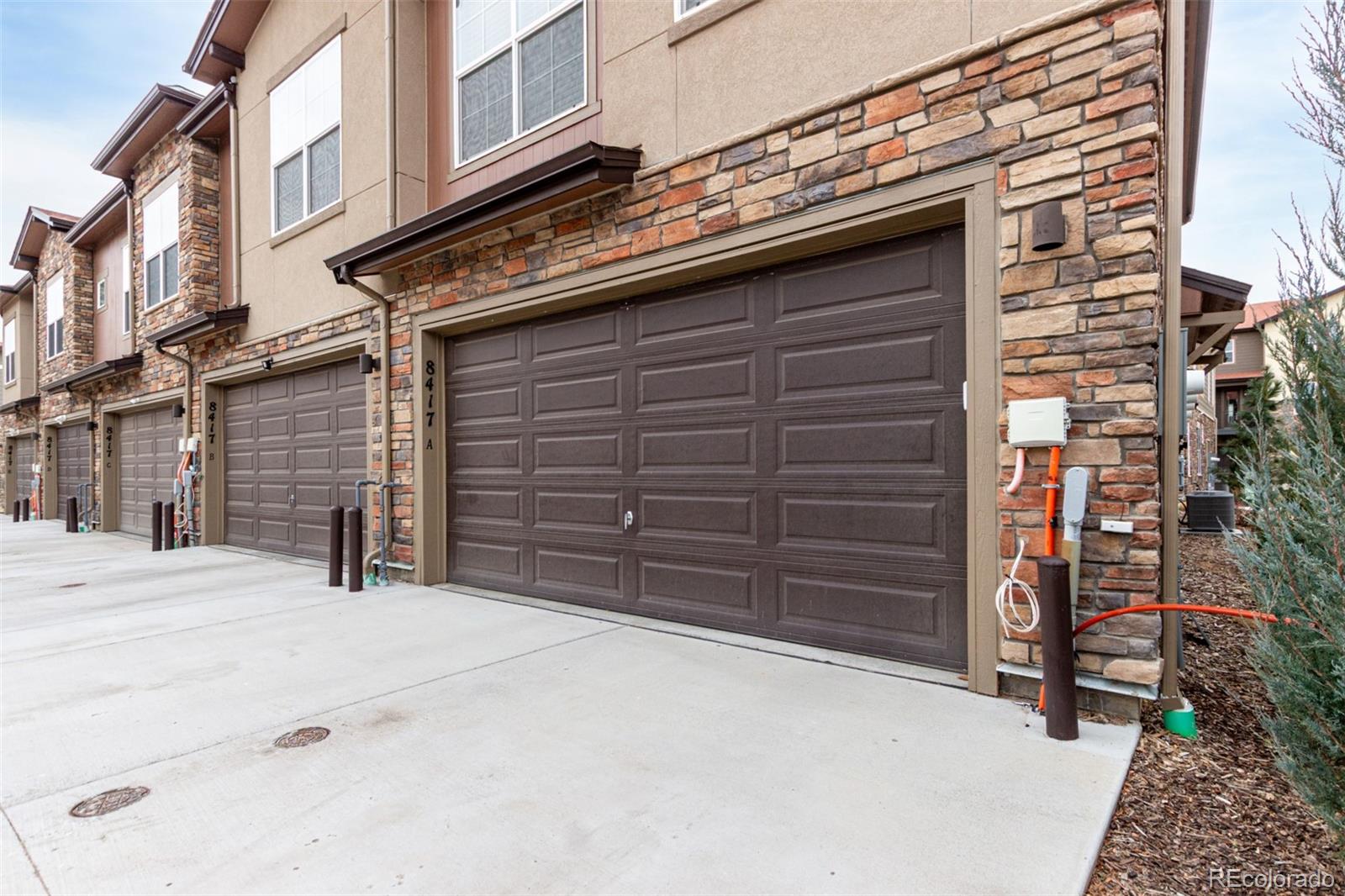 8417 Rizza Street, Unit A Littleton, CO 80129 - Photo 17 of 25 a view of a car garage