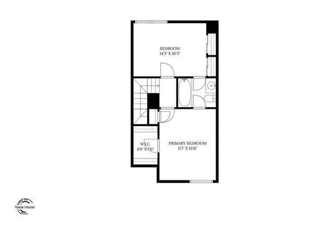 an empty room with a window and doors