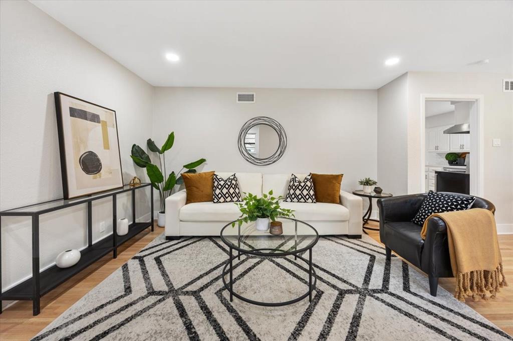 10524 Coleridge Street Dallas, TX 75218 - Photo 2 of 35 a living room with furniture and wooden floor