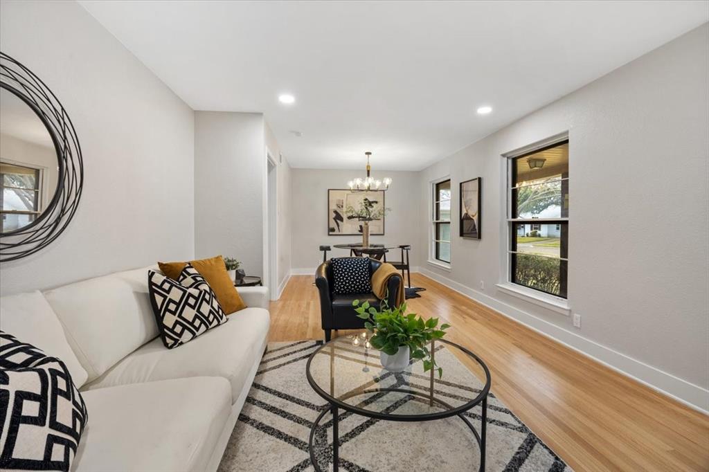10524 Coleridge Street Dallas, TX 75218 - Photo 3 of 35 a living room with furniture and wooden floor