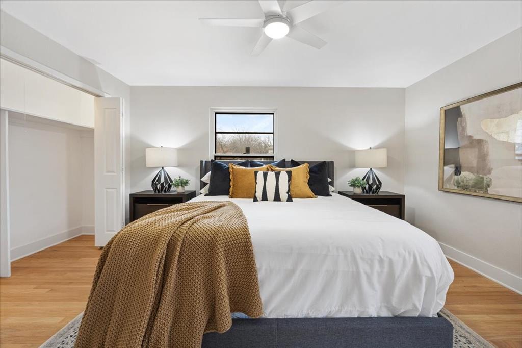 10524 Coleridge Street Dallas, TX 75218 - Photo 8 of 35 a bedroom with a bed and window