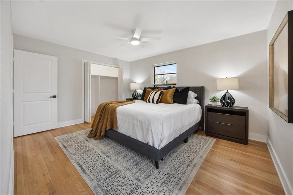 10524 Coleridge Street Dallas, TX 75218 - Photo 9 of 35 a bedroom with a large bed and a rug