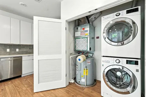 a view of washer and dryer in a utility room