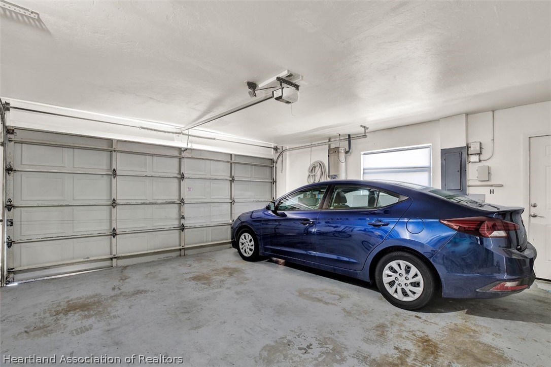 4204 Medina Way Sebring, FL 33875 - Photo 25 of 25 a car parked in a garage