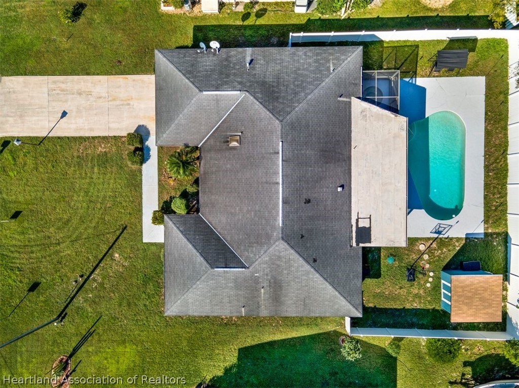 4204 Medina Way Sebring, FL 33875 - Photo 3 of 25 an aerial view of a house with a yard