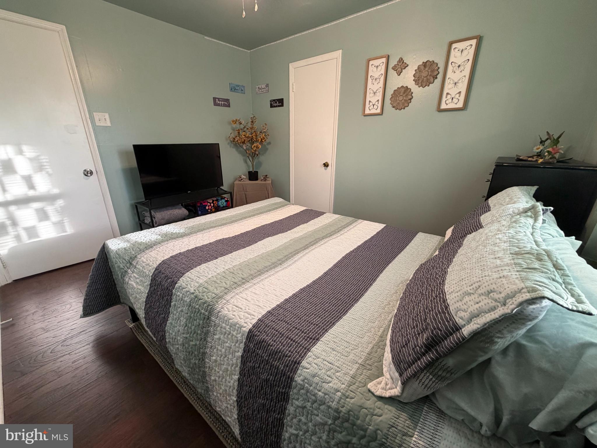 1 Nassau Road Somers Point, NJ 08244 - Photo 18 of 43 a bedroom with a bed and a tv