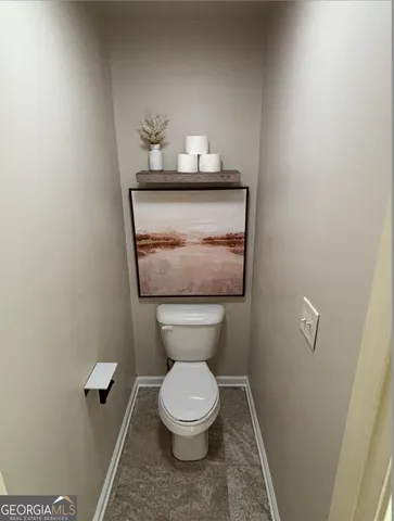 a bathroom with a toilet