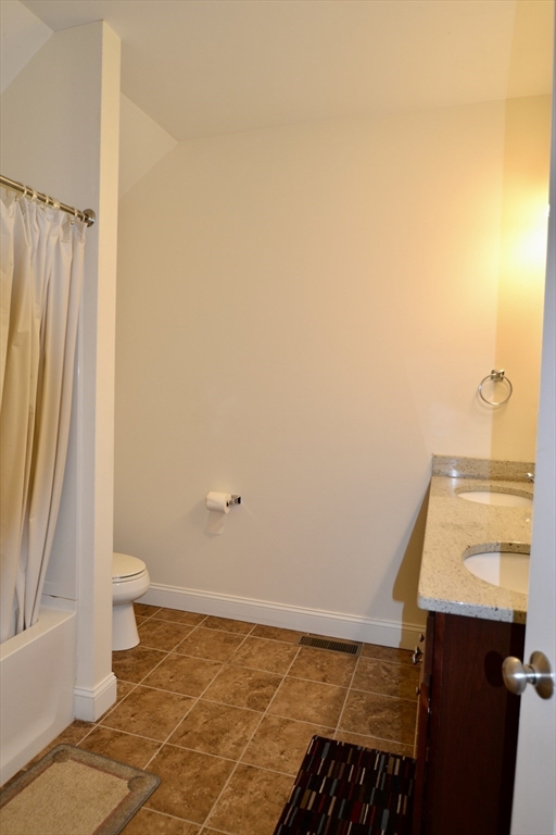 8 Cheyenne Valley, Unit 8 Westford, MA 01886 - Photo 18 of 27 a bathroom with a sink and a toilet
