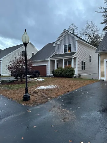 a front view of a house with street