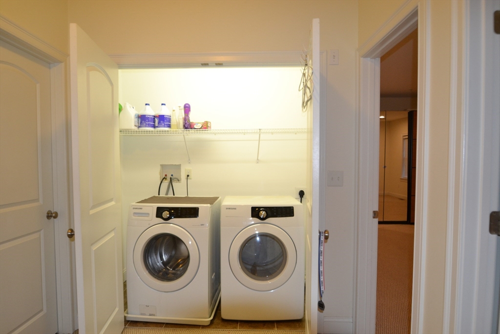 8 Cheyenne Valley, Unit 8 Westford, MA 01886 - Photo 21 of 27 a utility room with dryer and washer