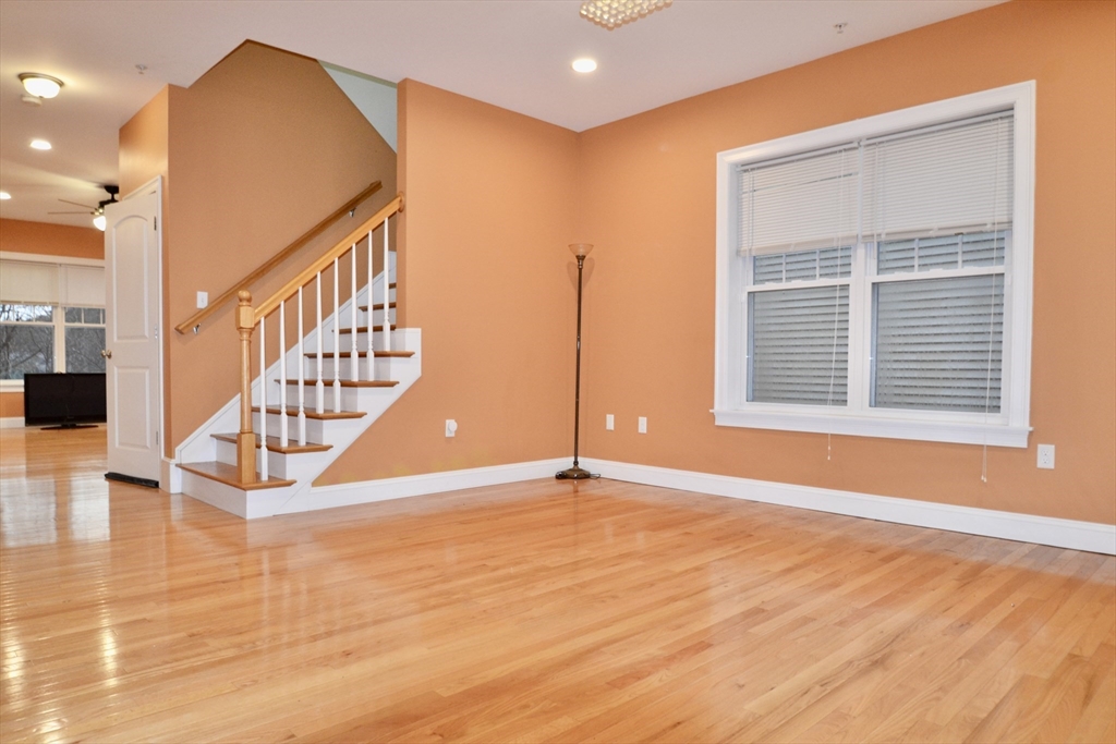 8 Cheyenne Valley, Unit 8 Westford, MA 01886 - Photo 4 of 27 a view of an entryway with wooden floor