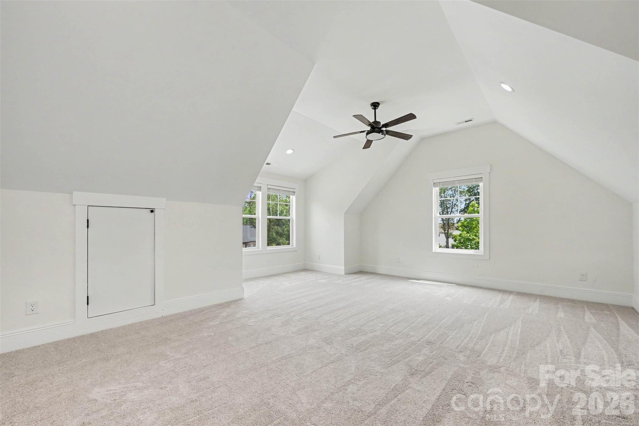 31 Ridgecrest Avenue Peachland, NC 28133 - Photo 4 of 30 wooden floor in an empty room with a window