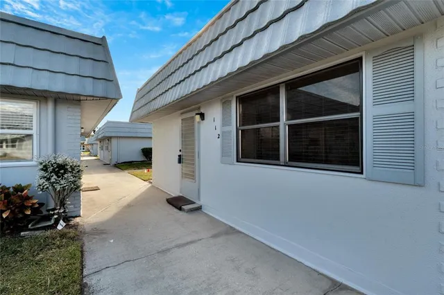 a house view with a outdoor space