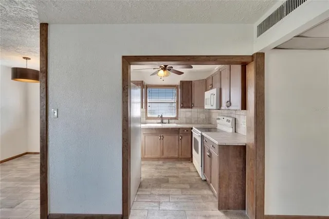 a large bathroom with a double vanity sink and a mirror