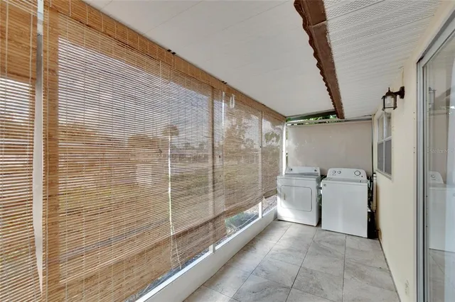 a view of a bathroom with a bathtub