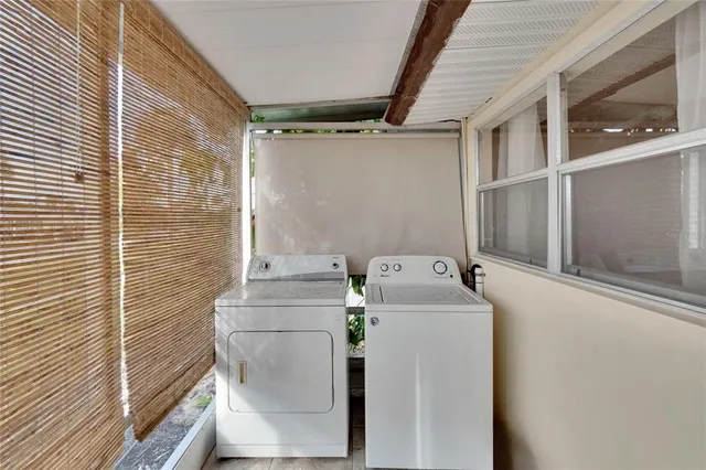 a view of a hallway with a chair