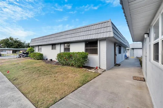 a view of a house with a patio