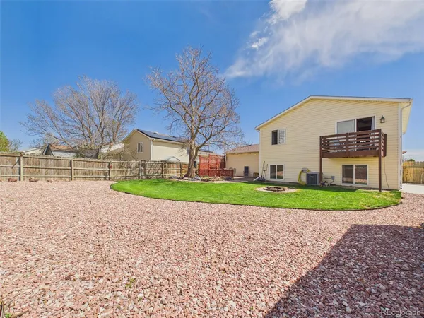 a view of road with house in front of it