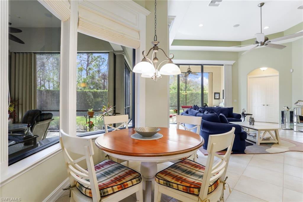 7433 Byrons Way Naples, FL 34113 - Photo 12 of 34 a outdoor space with patio couch and a potted plant