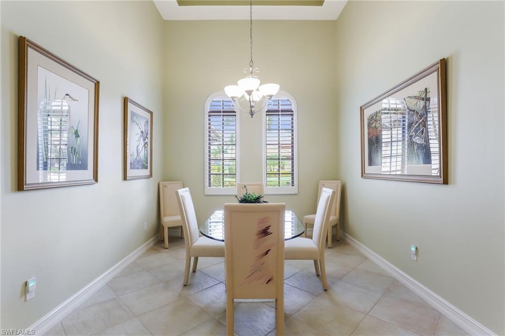 7433 Byrons Way Naples, FL 34113 - Photo 19 of 34 a dining room with furniture and window