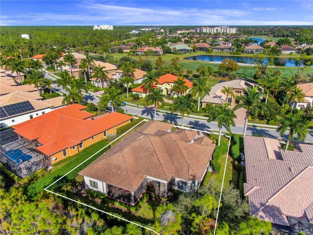 7433 Byrons Way Naples, FL 34113 - Photo 2 of 34 an aerial view of a house with a yard