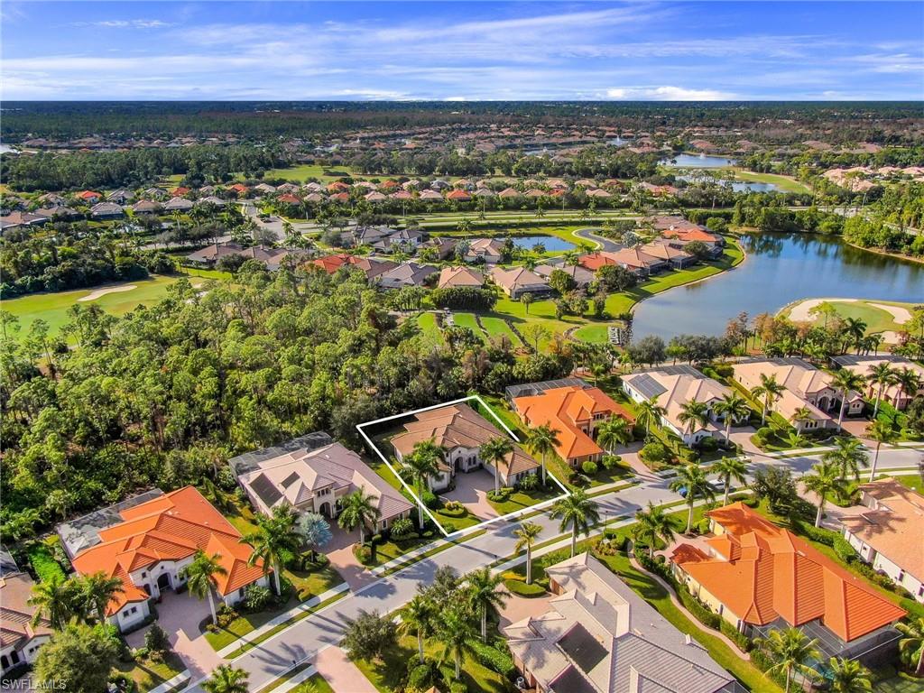 7433 Byrons Way Naples, FL 34113 - Photo 4 of 34 an aerial view of residential houses with outdoor space
