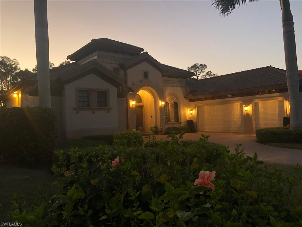 7433 Byrons Way Naples, FL 34113 - Photo 7 of 34 a view of a house with a backyard