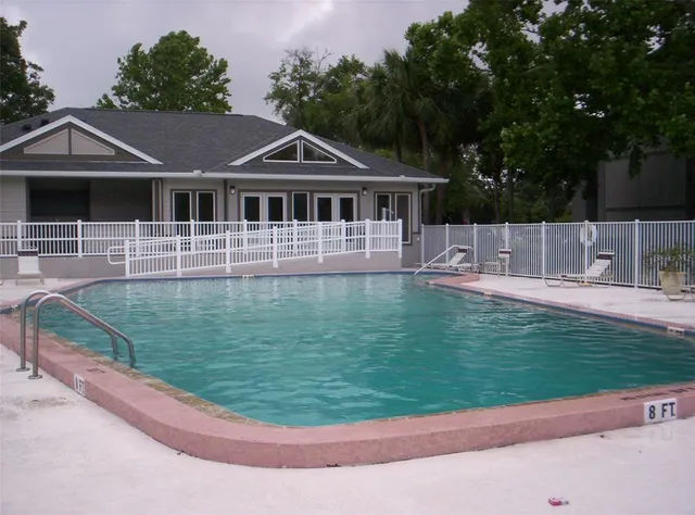 a view of a house with a swimming pool