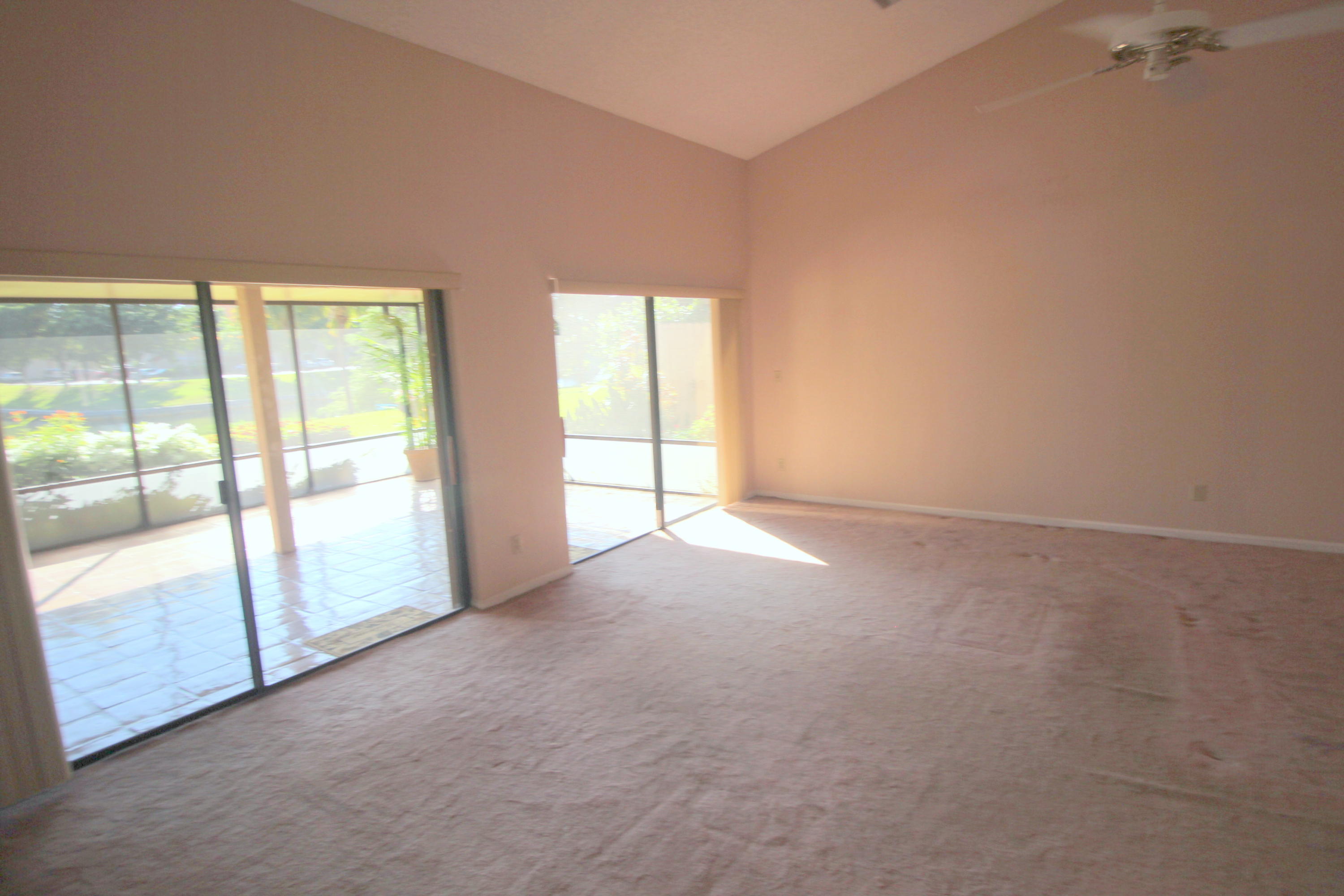 23328 Water Circle Boca Raton, FL 33486 - Photo 11 of 44 Living Room Sliders to Canal View Patio