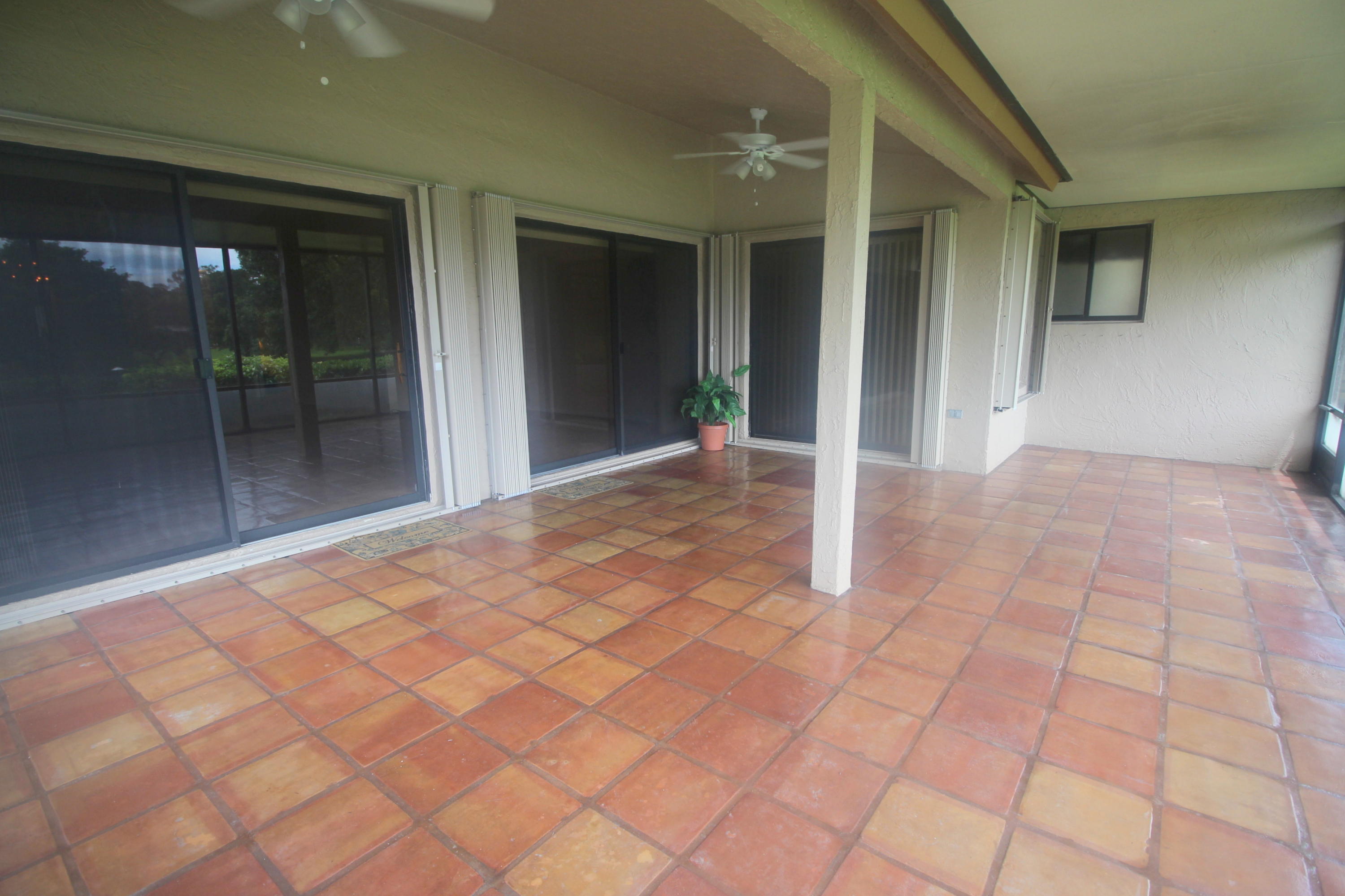 23328 Water Circle Boca Raton, FL 33486 - Photo 12 of 44 Extended Canal View Patio
