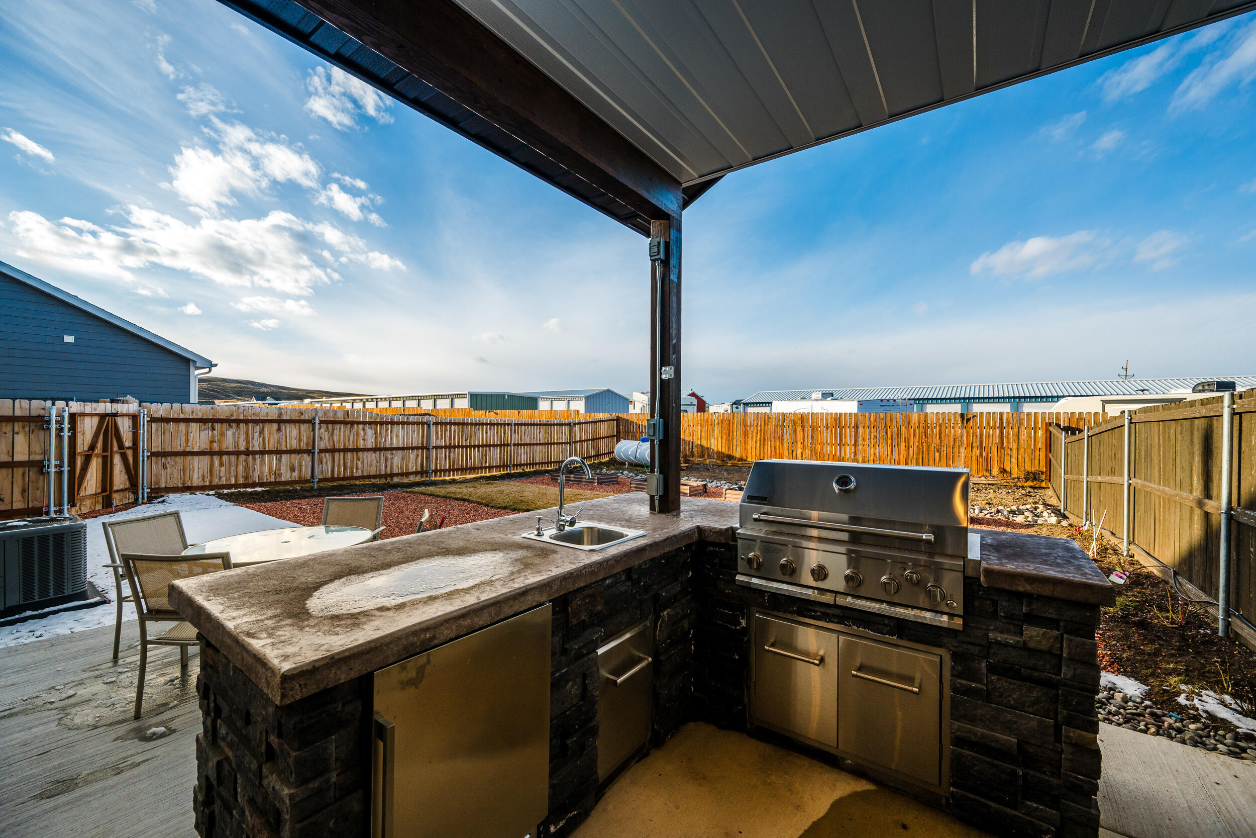 1353 Stoneridge Drive Ranchester, WY 82839 - Photo 34 of 42 vback patio BBQ kitchenette