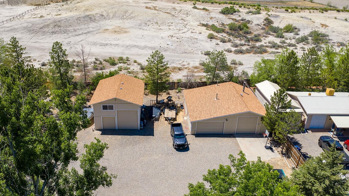 607-28 28 3/4 Road Grand Junction, CO 81506 - Photo 40 of 42 an aerial view of a house with a yard and trees