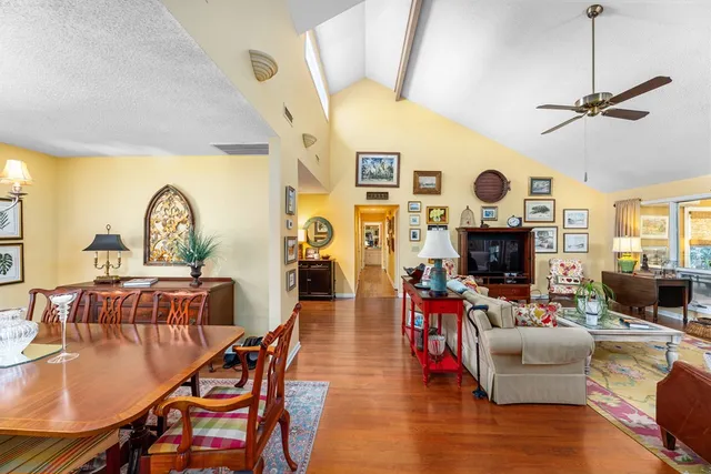 a living room with fireplace furniture and a fireplace