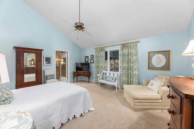 a bed room with a bed and furniture