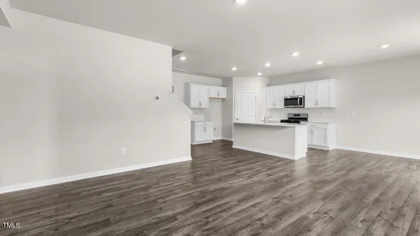 a view of kitchen with wooden floor