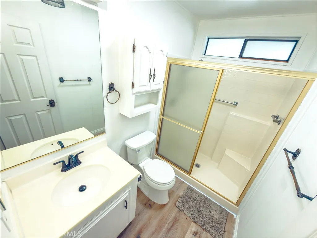 840 East Foothill Boulevard, Unit 203 Azusa, CA 91702 - Photo 24 of 45 a bathroom with a sink toilet and shower