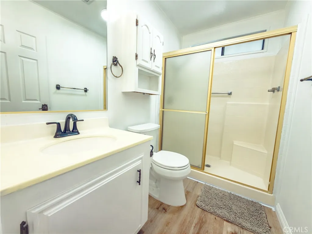 840 East Foothill Boulevard, Unit 203 Azusa, CA 91702 - Photo 25 of 45 a bathroom with a sink a toilet and shower