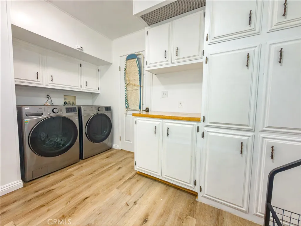 840 East Foothill Boulevard, Unit 203 Azusa, CA 91702 - Photo 26 of 45 a view of a kitchen with washer and dryer