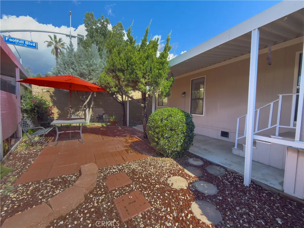 840 East Foothill Boulevard, Unit 203 Azusa, CA 91702 - Photo 29 of 45 a view of a chairs and tables in the patio