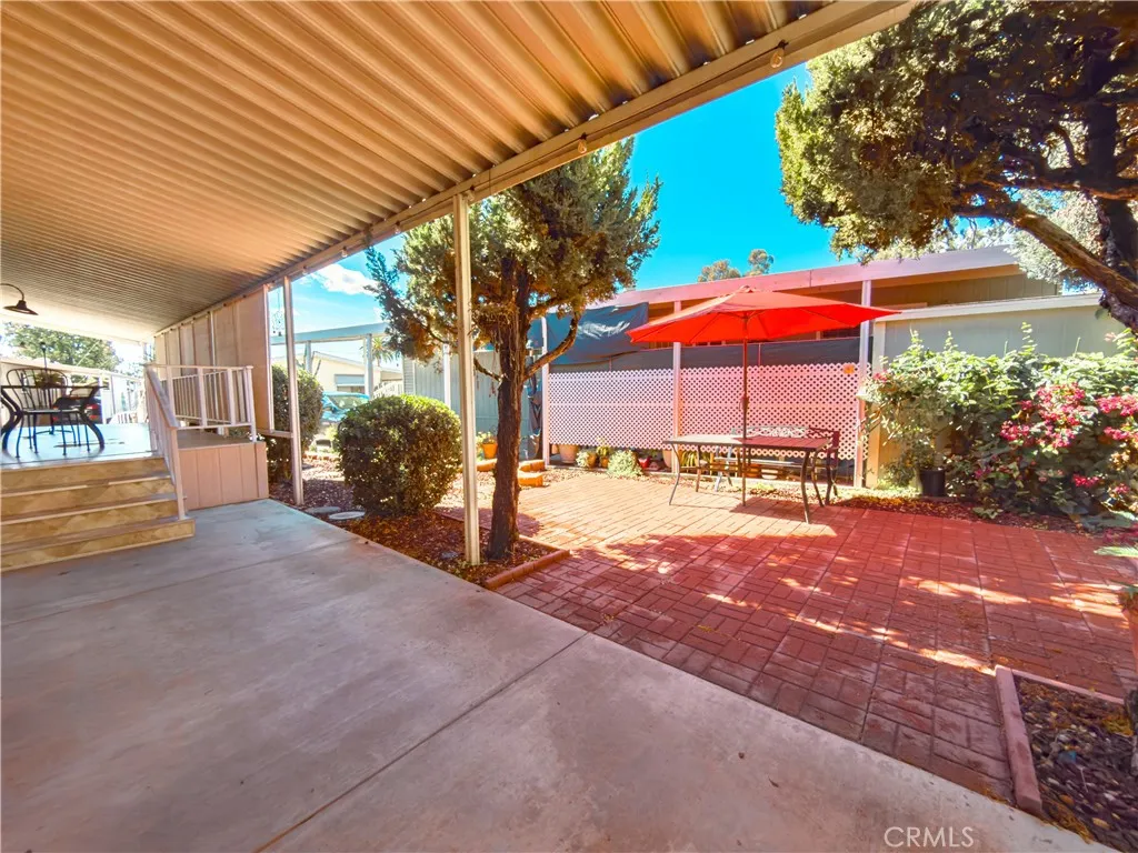840 East Foothill Boulevard, Unit 203 Azusa, CA 91702 - Photo 31 of 45 a view of a house with a yard and tree s