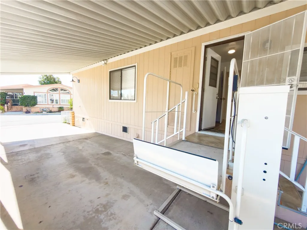 840 East Foothill Boulevard, Unit 203 Azusa, CA 91702 - Photo 32 of 45 a view of a hallway with wooden floor and windows