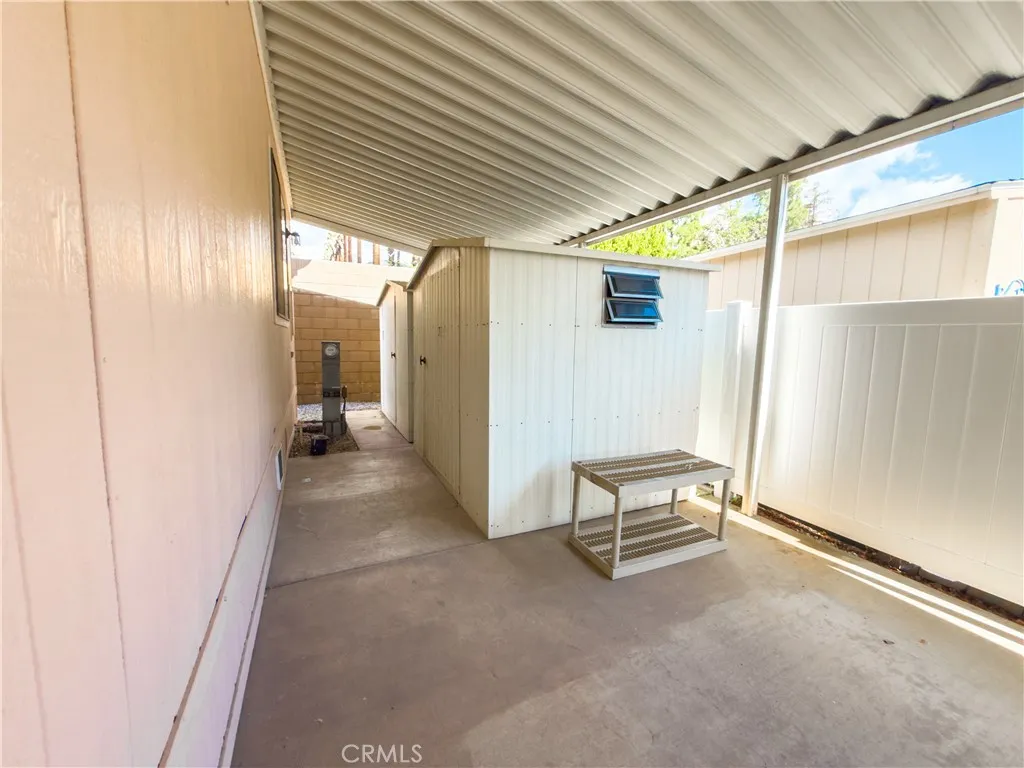 840 East Foothill Boulevard, Unit 203 Azusa, CA 91702 - Photo 34 of 45 a view of a hallway with furniture and windows